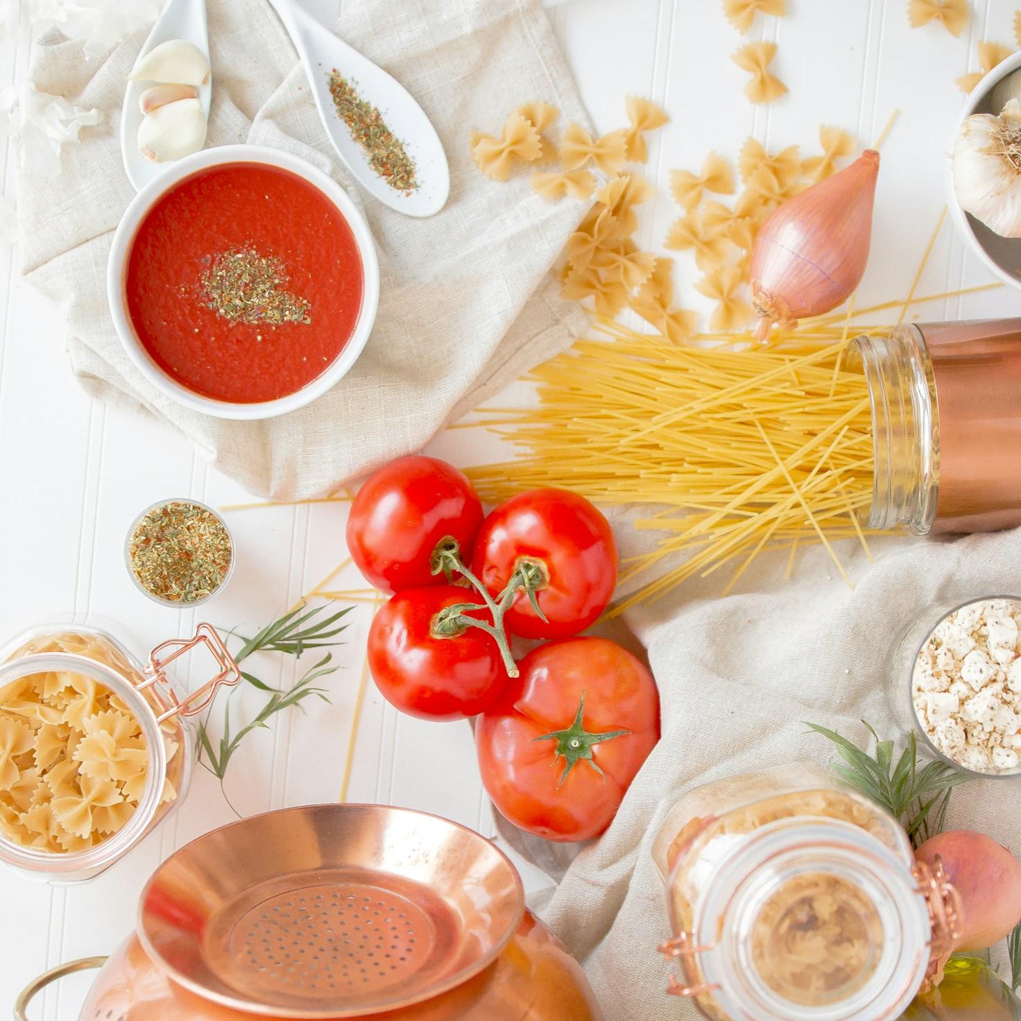 Community members collaborating in a modern kitchen space, sharing recipes and cooking techniques